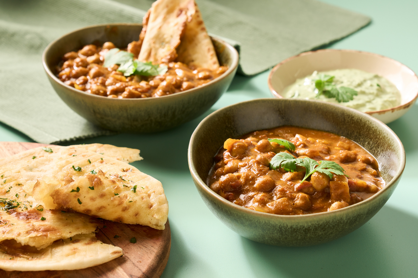 Chickpea curry with raita and naan